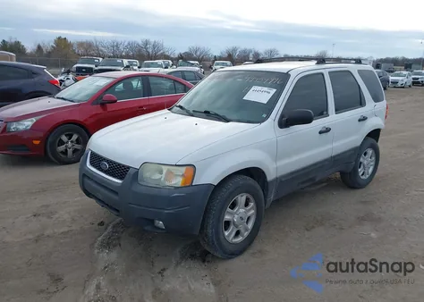 2004 Ford Escape Xlt z USA, uszkodzony, nr VIN 1FMYU93184DA16859